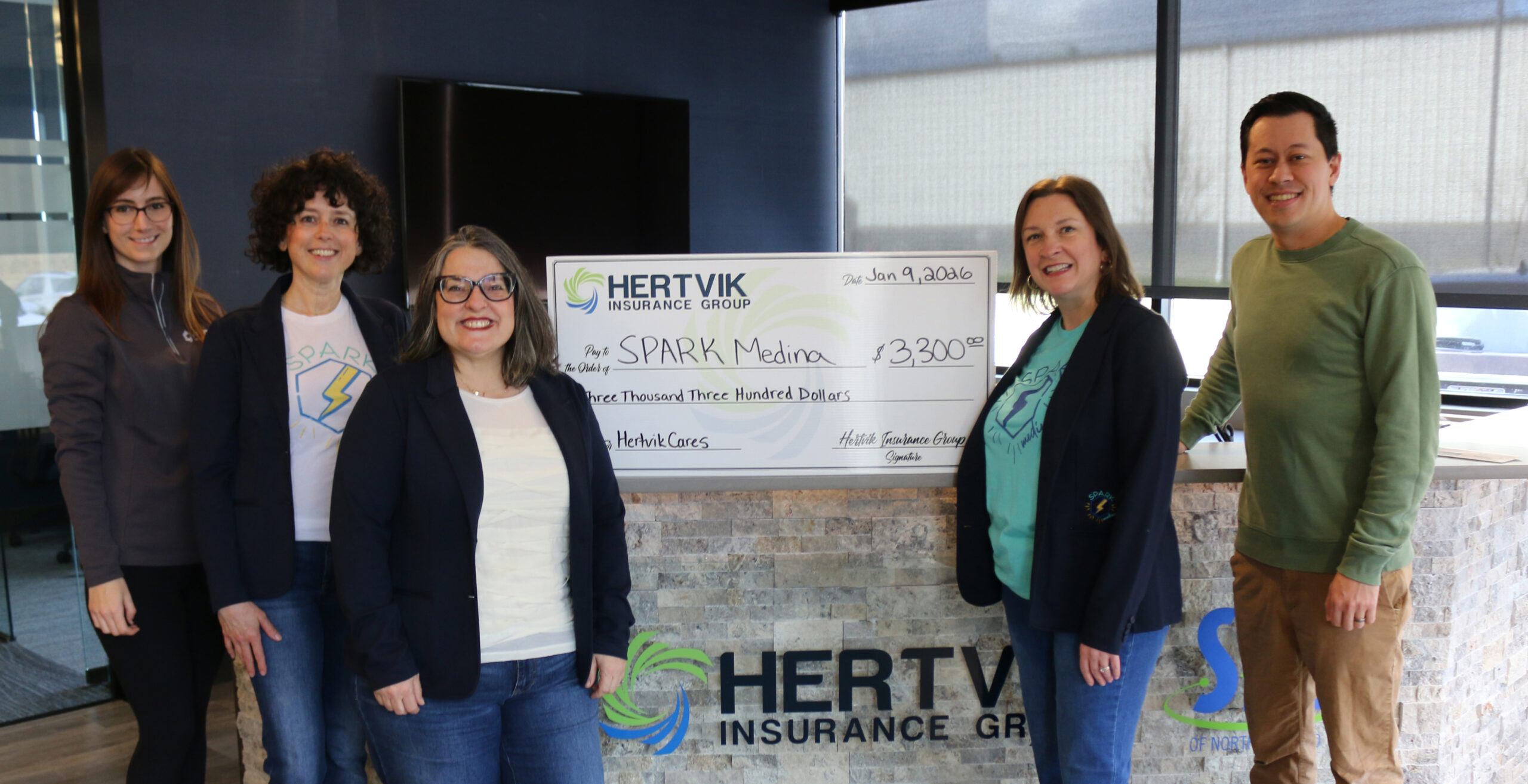 Hertvik Insurance Group Lends a Hand to SPARK Medina with a $3,400 Donation Hertvik Cares